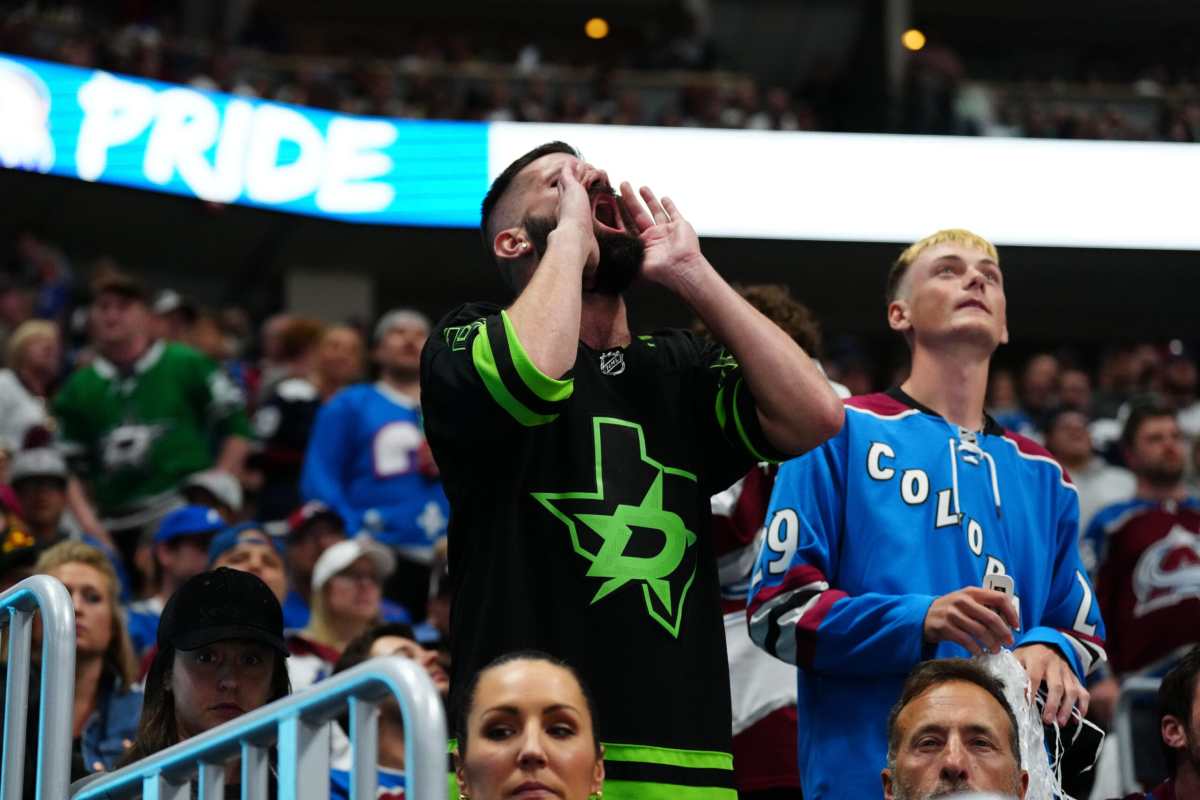 May 17, 2024; Denver, Colorado, USA; Dallas Stars and Colorado Avalanche fans react to a disallowed goal in an overtime period in game six of the second round of the 2024 Stanley Cup Playoffs at Ball Arena. Mandatory Credit: Ron Chenoy-USA TODAY Sports
